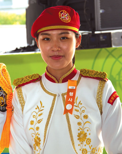 A female soldier in ceremonial uniform. [PHOTO: TOM MACGREGOR]