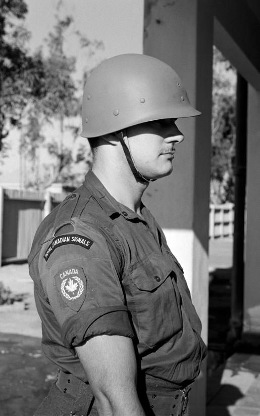 A Canadian soldier wearing UN shoulder badges, December 1956. [PHOTO: UNMULTIMEDIA—UN141173]