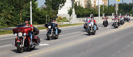 The bikers arrive in Kanata. [PHOTO: ADAM DAY]