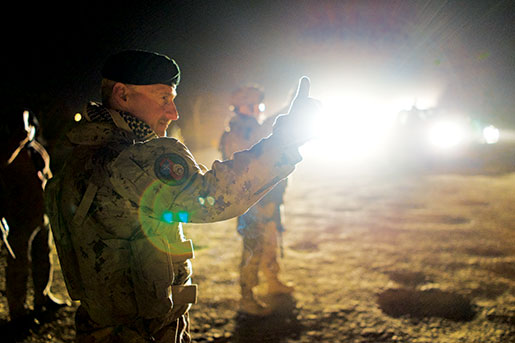 Colonel Ian Hope watches a newly trained Afghan battalion deploy, March 2013. [PHOTO: ADAM DAY]