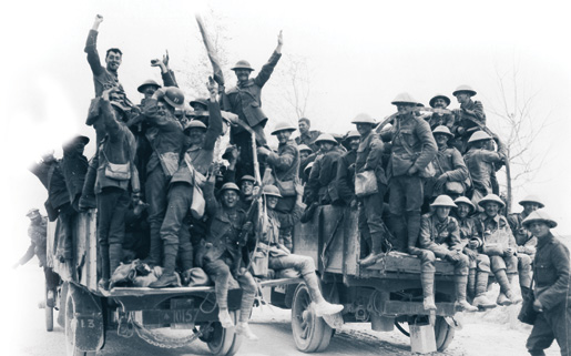 Happy Canadians who captured Vimy Ridge returning to rest billets on motor lorries. [PHOTO: LIBRARY AND ARCHIVES CANADA—PA001353]