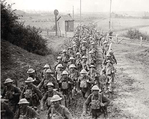 Canadian soldiers march towards the front lines, October 1917. [PHOTO: DEPARTMENT OF NATIONAL DEFENCE/LIBRARY AND ARCHIVES CANADA—PA001994]