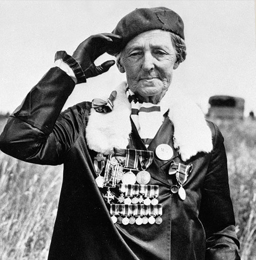 During a pilgrimage to Vimy in 1936, Charlotte Wood wears the medals of her sons who served. [PHOTO: LIBRARY AND ARCHIVES CANADA—PA148875]
