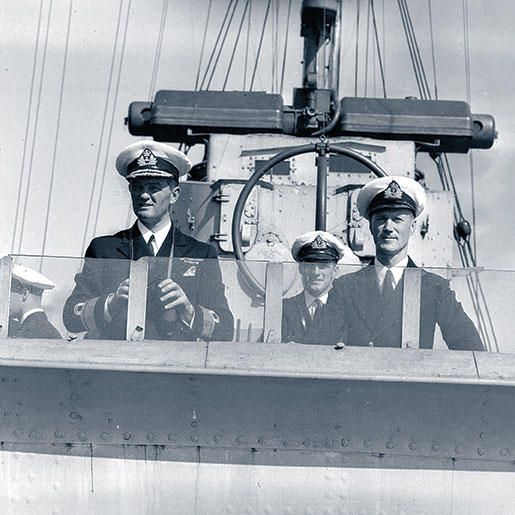 Lieutenant-Commander J.H. Stubbs (right) as seen in September 1940 on the bridge of HMCS Assiniboine with Commodore G.C. Jones. Note the ship’s MF/DF antenna (two large circular tubes set at 90 degrees from each other) in the background. [PHOTO: NATIONAL DEFENCE/LIBRARY AND ARCHIVES CANADA—PA104263]