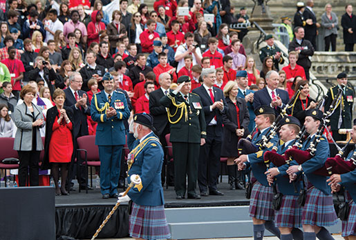 Governor General David Johnston salutes as the parade marches past. [PHOTO: TOM MacGREGOR]
