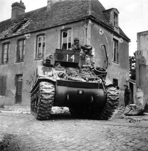 Sherman tank of the Sherbrooke Fusiliers Regiment, Caen, 1944. [PHOTO: LIBARY AND ARCHIVES CANADA—PA162583]