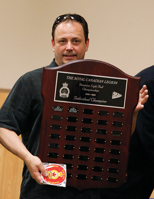Singles winner John White from Ontario Command displays his trophy. [PHOTO: ADAM DAY]
