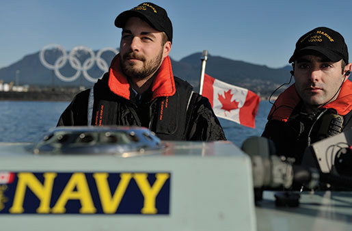 Navy personnel conduct a security patrol aboard a rigid-hulled inflatable boat during the 2010 Winter Olympics in Vancouver. [PHOTO: SGT. PAZ QUILLÉ, CANADIAN FORCES COMBAT CAMERA]