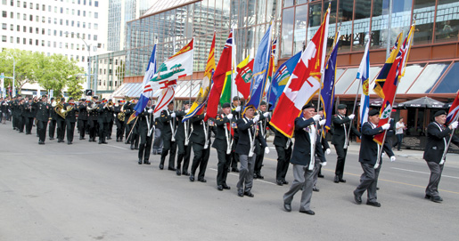 Legionnaires march toward the convention hall. [PHOTO: LEGION MAGAZINE]