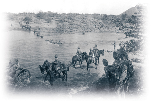 Troops of the Royal Canadian Regiment crossing Paardeberg Drift. [PHOTO: LIBRARY AND ARCHIVES CANADA—C014923]