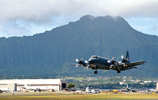 A Royal Canadian Air Force Aurora takes off during a training exercise in Hawaii in July. [PHOTO: SGT. MATTHEW McGREGOR, CANADIAN FORCES COMBAT CAMERA]