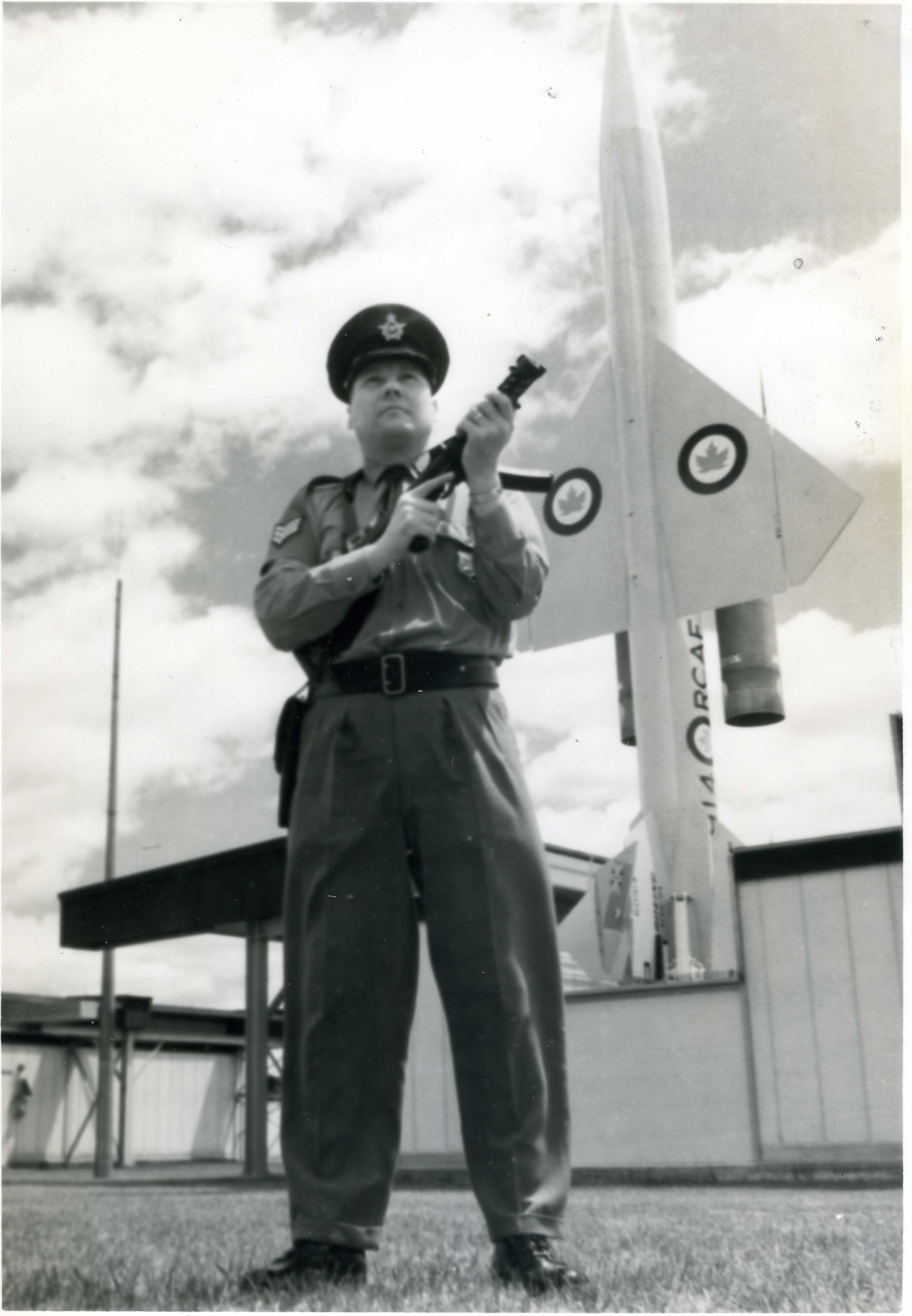 RCAF police Sergeant Robert G. Stevenson of Victorian, B.C., a member of 446 Security Squadron, guards a Bomarc missile site at RCAF station North Bay, Ont., in July,1964 Credit: Royal Canadian Airforce Photograph