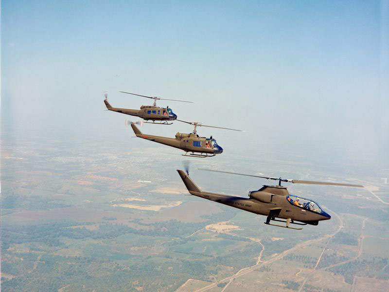 Bell Helicopter’s prototype for the AH-1G Cobra flies ahead of two UH-1 Hueys, the aircraft it was designed to protect.